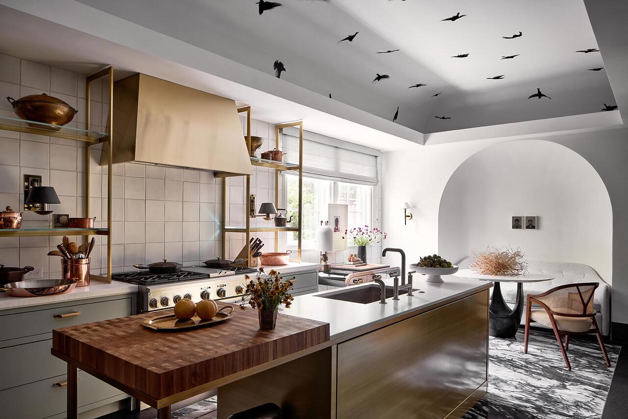 bright modern kitchen with gold accents