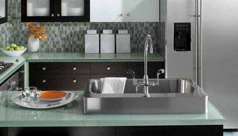kitchen peninsula with stainless steel sink