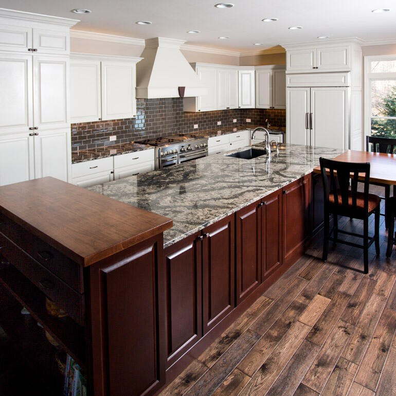 l shaped kitchen with dark red accents